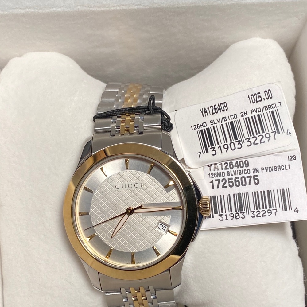 New Gucci watch, purchased at Gucci store as gift.